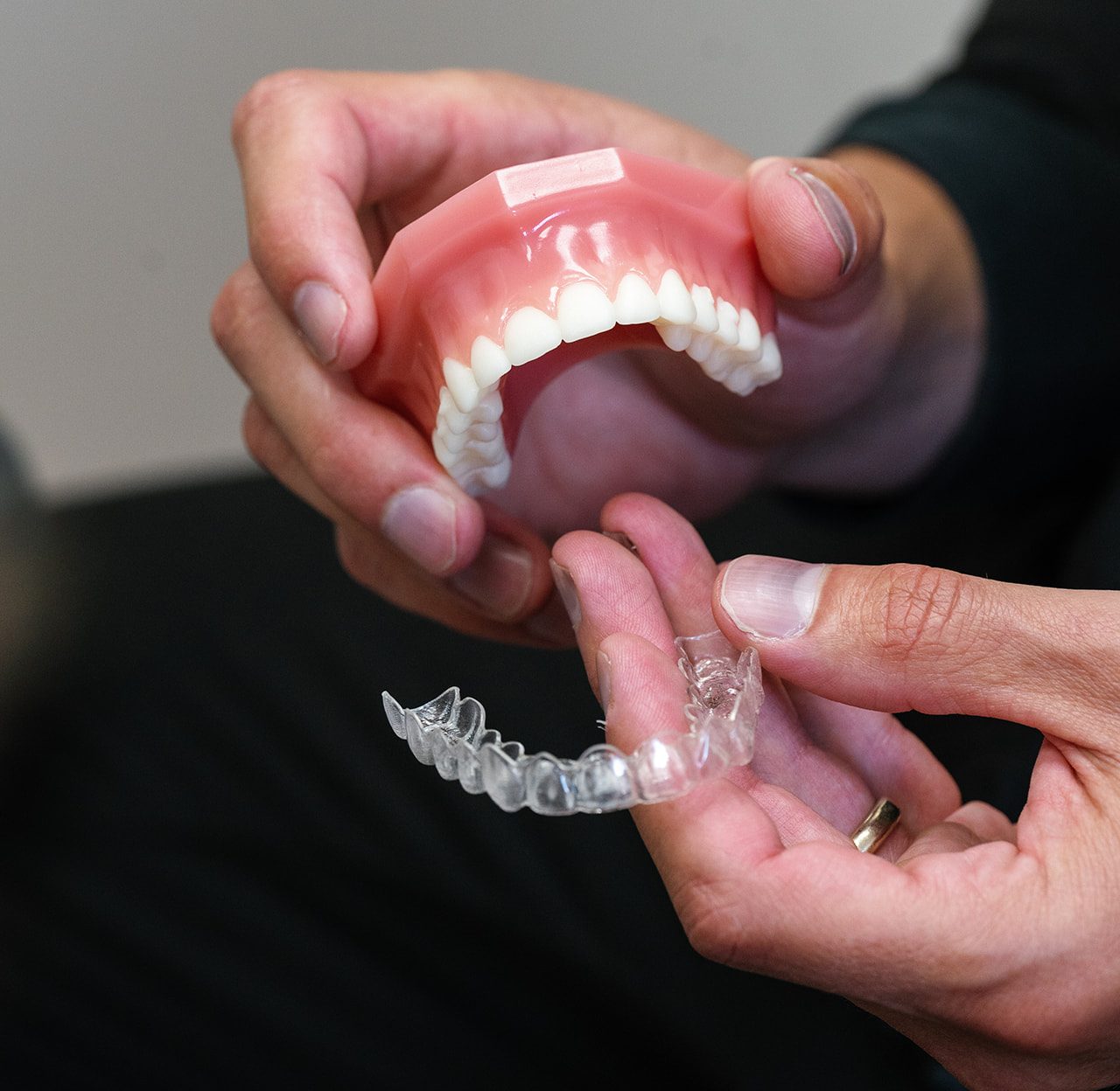 Postle Dental Group team providing Invisalign treatment